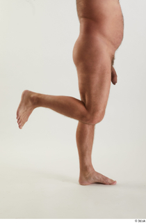 Neeo 1 calf flexing nude side view 0004.jpg